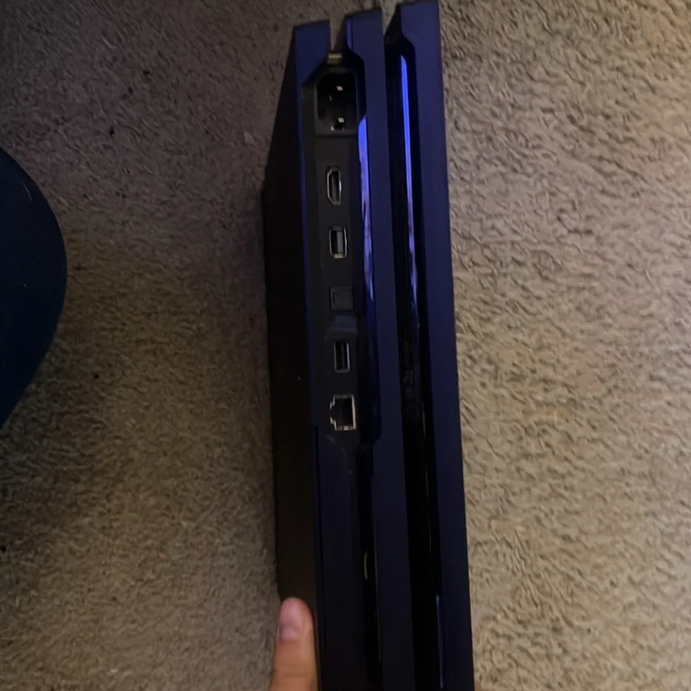 This is a PS4 in good condition it just is peeling a little bit on a cord